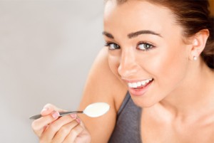 woman eating probiotics